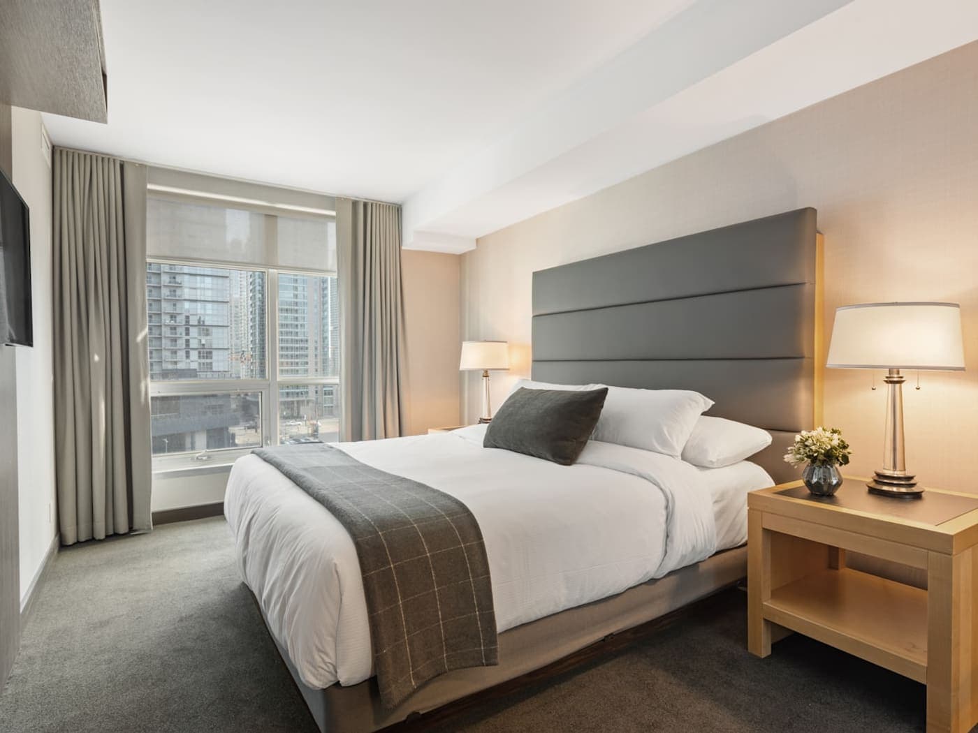 Guest-ready bedroom with fresh linens after Airbnb turnover cleaning